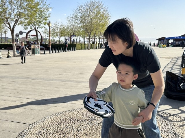 内蒙古电力集团乌海供电公司联合工会：开展“趣玩春日 盘出精彩”元气飞盘活动 (1).jpg